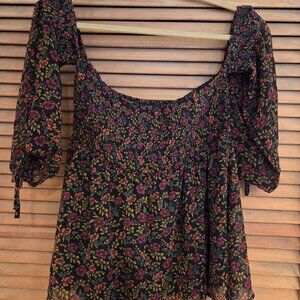 flowy blouse can be worn on or off the shoulder